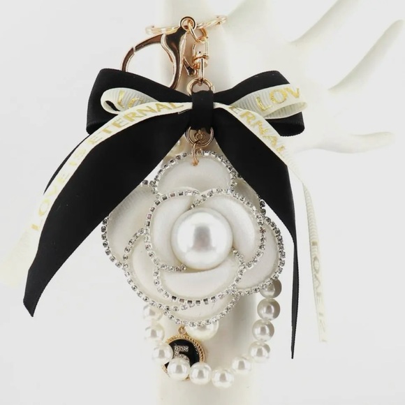 Accessories - Elegant White Flower Keychain with Black Bow